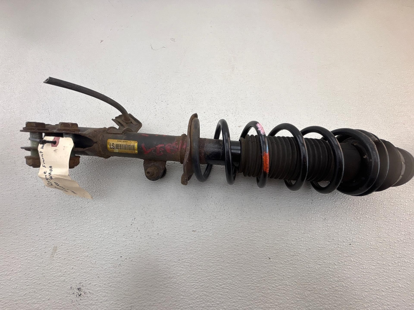14-19 Nissan Versa Front Left Driver Side Shock Absorber & Spring OEM