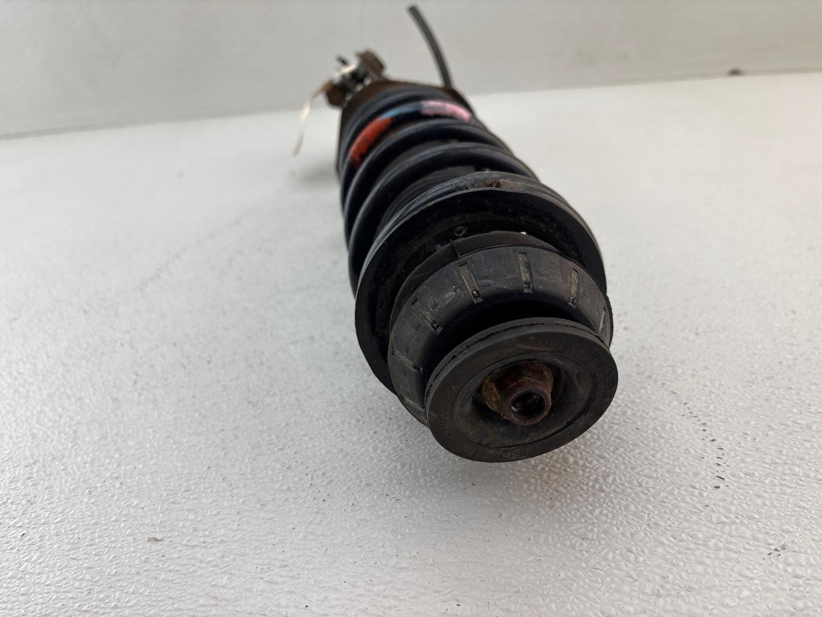 14-19 Nissan Versa Front Left Driver Side Shock Absorber & Spring OEM